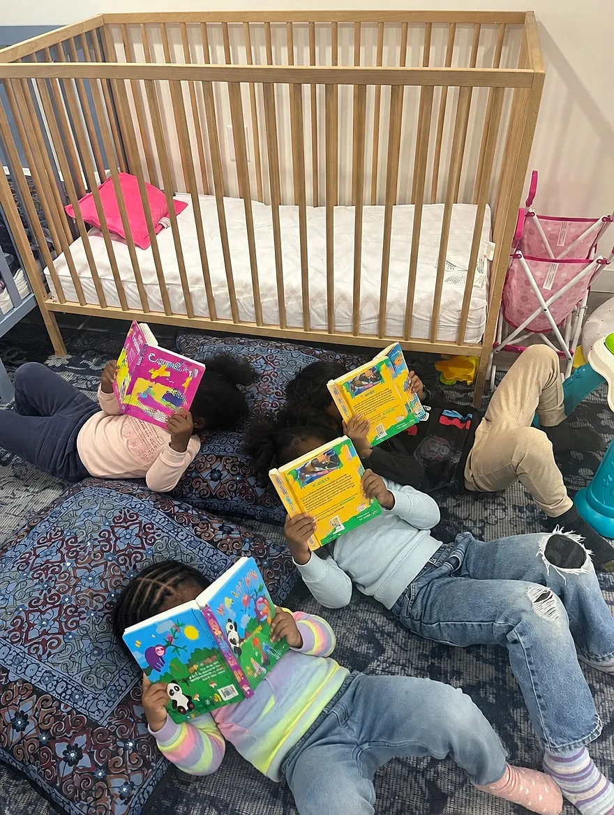 Quiet reading time on soft cushions.